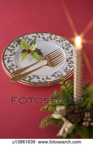 Stock Photo - Christmas Candle and Plate. Fotosearch
