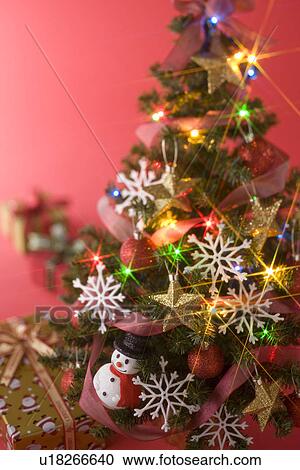 Stock Image - Christmas Tree and Present. Fotosearch