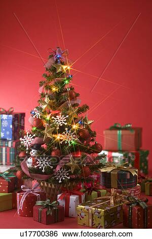 Stock Photograph - Christmas Tree and Present. Fotosearch