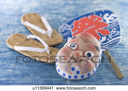 Mask of Hyottoko, Zori and Fan View Large Photo Image Stock Image - Mask of Hyottoko, Zori and Fan. Fotosearch