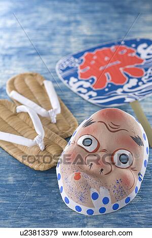 Stock Photo - Mask of Hyottoko, Zori and Fan. Fotosearch