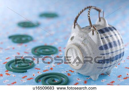 Mosquito Coil and Pig-shaped Container View Large Photo Image Stock Image - Mosquito Coil and Pig-shaped Container. Fotosearch