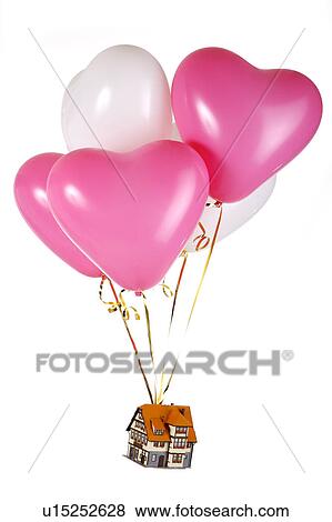 A toy house flying with balloons View Large Photo Image Stock Photo - A toy house flying with balloons. Fotosearch