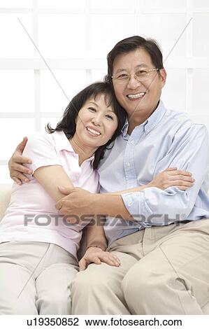Couple, Couple bonding together and smiling at the camera View Large Photo Image Stock Image - Couple, Couple bonding together and smiling at the camera. Fotosearch