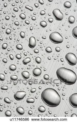 Drops on surface View Large Photo Image Stock Photograph - Drops on surface. Fotosearch