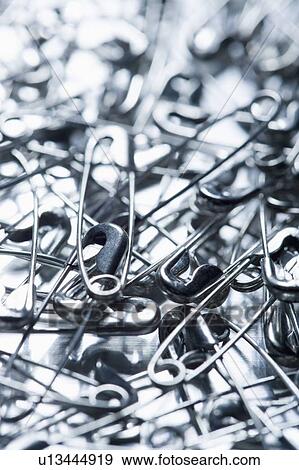 Safety Pins scattered View Large Photo Image Stock Photo - Safety Pins scattered. Fotosearch