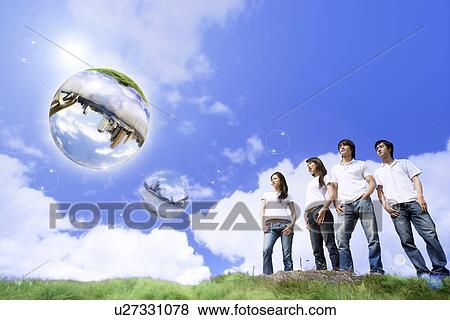 Lohas, Environmental Conservation, Digitally generated image of four people standing on the grass View Large Photo Image Stock Photo - Lohas, Environmental Conservation, Digitally generated image of four people standing on the grass. Fotosearch