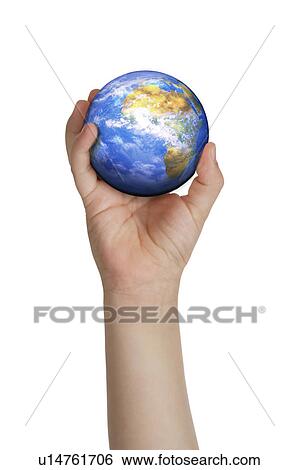 Stock Photograph - Lohas, Environmental Conservation, Digitally generated image of human hand holding the earth. Fotosearch