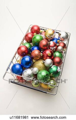 A basket of colorful Christmas baubles View Large Photo Image Stock Image - A basket of colorful Christmas baubles. Fotosearch