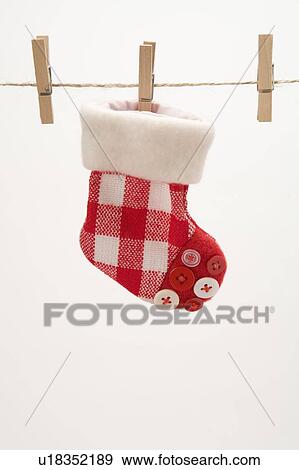 A decoration stock clipped on a clothesline View Large Photo Image Stock Photo - A decoration stock clipped on a clothesline. Fotosearch