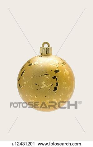 Stock Image - A golden Christmas bauble. Fotosearch