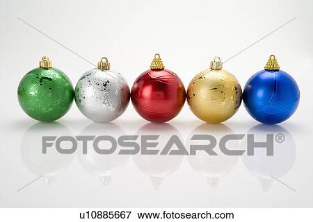 A row of Christmas baubles View Large Photo Image Stock Photo - A row of Christmas baubles. Fotosearch