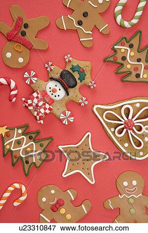Gingerbread Cookie on red background View Large Photo Image Stock Photo - Gingerbread Cookie on red background. Fotosearch