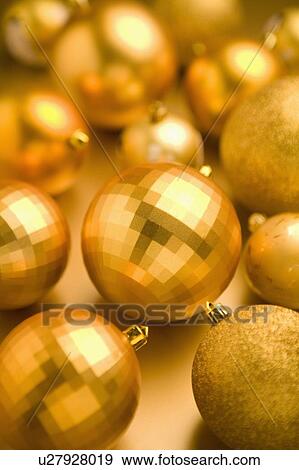 Golden Christmas baubles View Large Photo Image Stock Photo - Golden Christmas baubles. Fotosearch