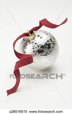 Stock Photography - Ribbon on a Christmas bauble. Fotosearch
