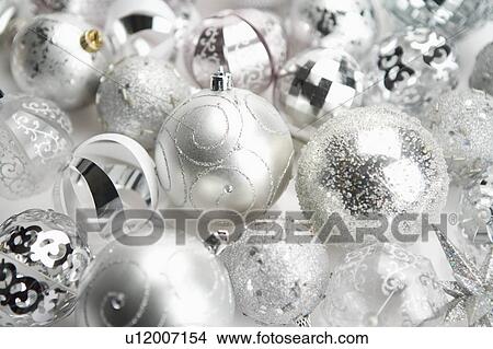Picture - Silver Christmas baubles. Fotosearch