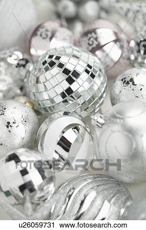 Stock Image - Silver Christmas Baubles. Fotosearch