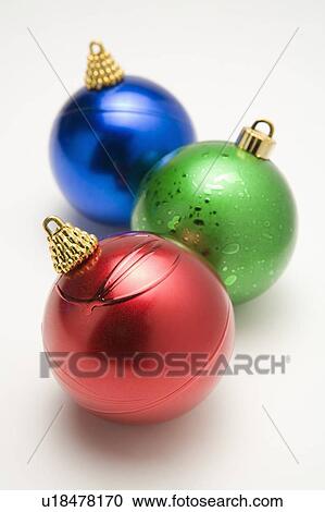 Three Christmas baubles View Large Photo Image Stock Image - Three Christmas baubles. Fotosearch