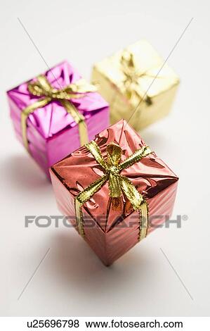 Three gift packages View Large Photo Image Stock Photo - Three gift packages. Fotosearch