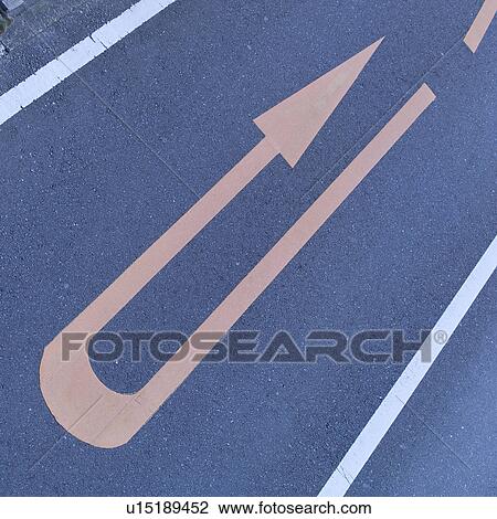 Stock Image - Arrow sign on road. Fotosearch