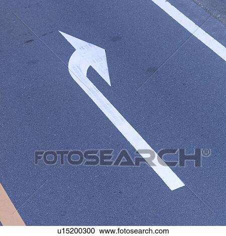 Stock Image - Arrow sign on road. Fotosearch
