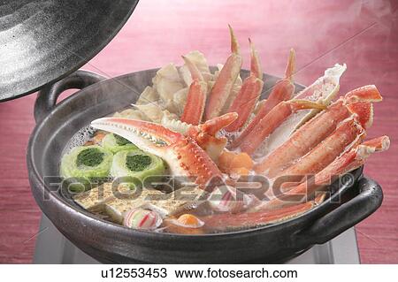 Stock Image - Boiled seafood in pot. Fotosearch