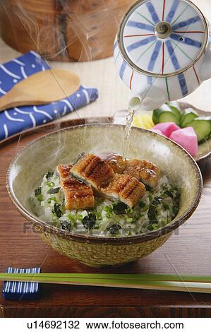 Bowl of rice with green tea View Large Photo Image Stock Image - Bowl of rice with green tea. Fotosearch