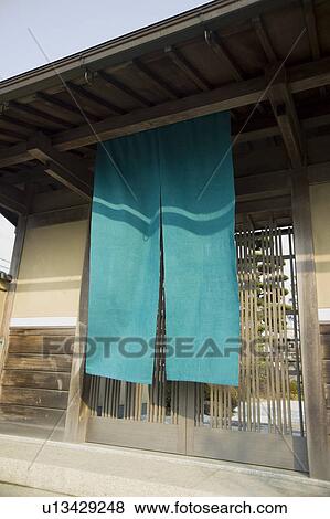 Cloth hanging outside lattice door View Large Photo Image Stock Photo - Cloth hanging outside lattice door. Fotosearch