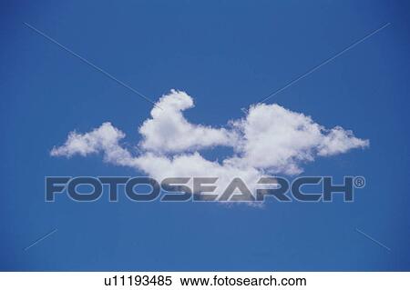 Clouds in clear blue sky View Large Photo Image Stock Photography - Clouds in clear blue sky. Fotosearch