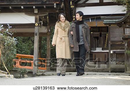 Couple at shrine View Large Photo Image Stock Image - Couple at shrine. Fotosearch