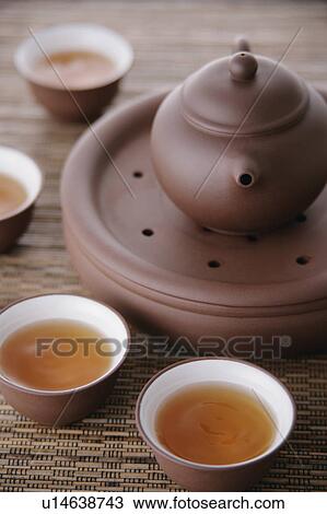 Stock Image - Cups of oolong tea. Fotosearch
