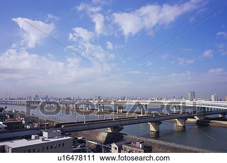 Elevated road over river, Tokyo, Japan View Large Photo Image Stock Image - Elevated road over river, Tokyo, Japan. Fotosearch