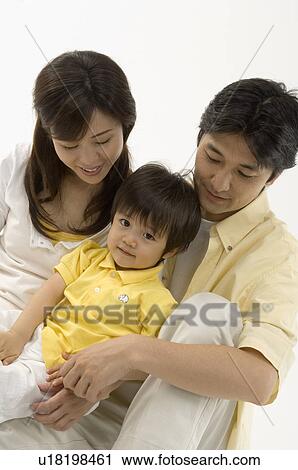 Stock Image - Family with one child. Fotosearch