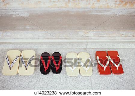 Stock Photo - Four pairs of Japanese sandals. Fotosearch