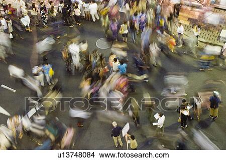 Picture - Group of people visiting summer festival in Japan. Fotosearch