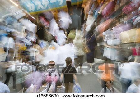 Group of people visiting summer festival in Japan View Large Photo Image Stock Image - Group of people visiting summer festival in Japan. Fotosearch