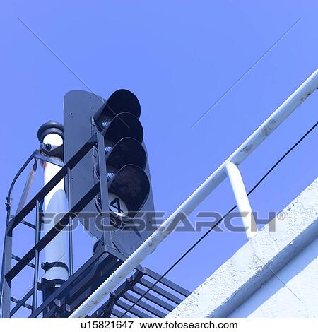 Stock Photo - Low angle view of signal. Fotosearch