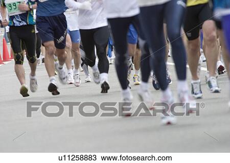 Marathon Athletes, blurred motion View Large Photo Image Stock Image - Marathon Athletes, blurred motion. Fotosearch