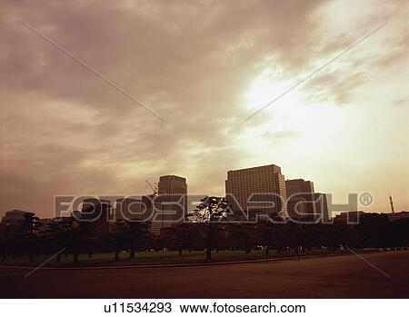 Stock Image - Marunouchi, Tokyo at sunset. Fotosearch
