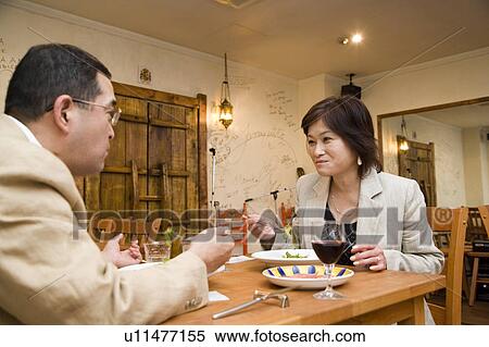 Mature couple dining in restaurant View Large Photo Image Stock Photography - Mature couple dining in restaurant. Fotosearch