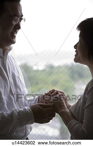 Mature couple holding hands View Large Photo Image Stock Image - Mature couple holding hands. Fotosearch
