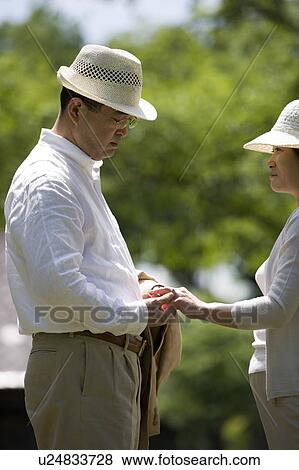 Mature couple holding hands View Large Photo Image Stock Photo - Mature couple holding hands. Fotosearch