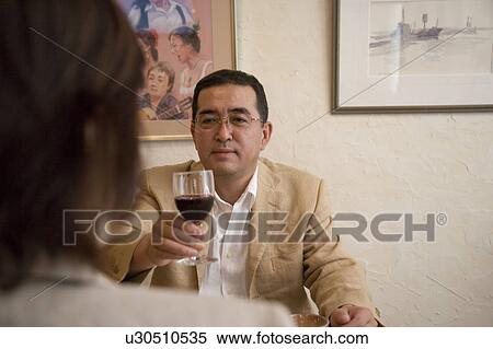 Mature man drinking wine in restaurant View Large Photo Image Stock Photography - Mature man drinking wine in restaurant. Fotosearch