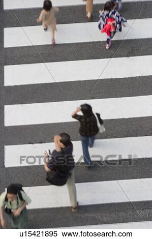 People crossing street in Japan View Large Photo Image Stock Photography - People crossing street in Japan. Fotosearch