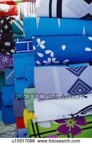 Stock Photo - Rolls of kimono fabric, close-up. Fotosearch