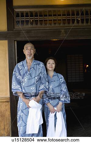 Picture - Senior couple standing wearing yukata. Fotosearch