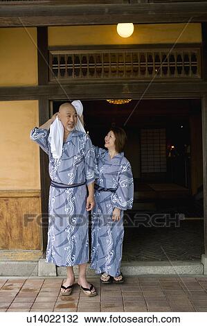 Senior couple standing wearing yukata View Large Photo Image Stock Image - Senior couple standing wearing yukata. Fotosearch