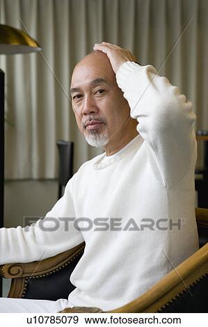 Senior man looking at camera View Large Photo Image Stock Photo - Senior man looking at camera. Fotosearch