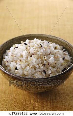Stock Image - Steamed rice in a rice bowl. Fotosearch