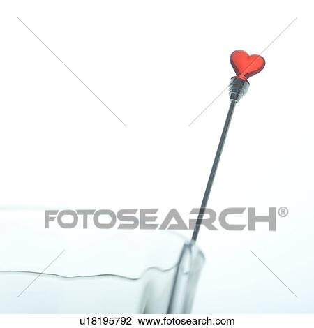 Stock Image - Stirrer in glass. Fotosearch